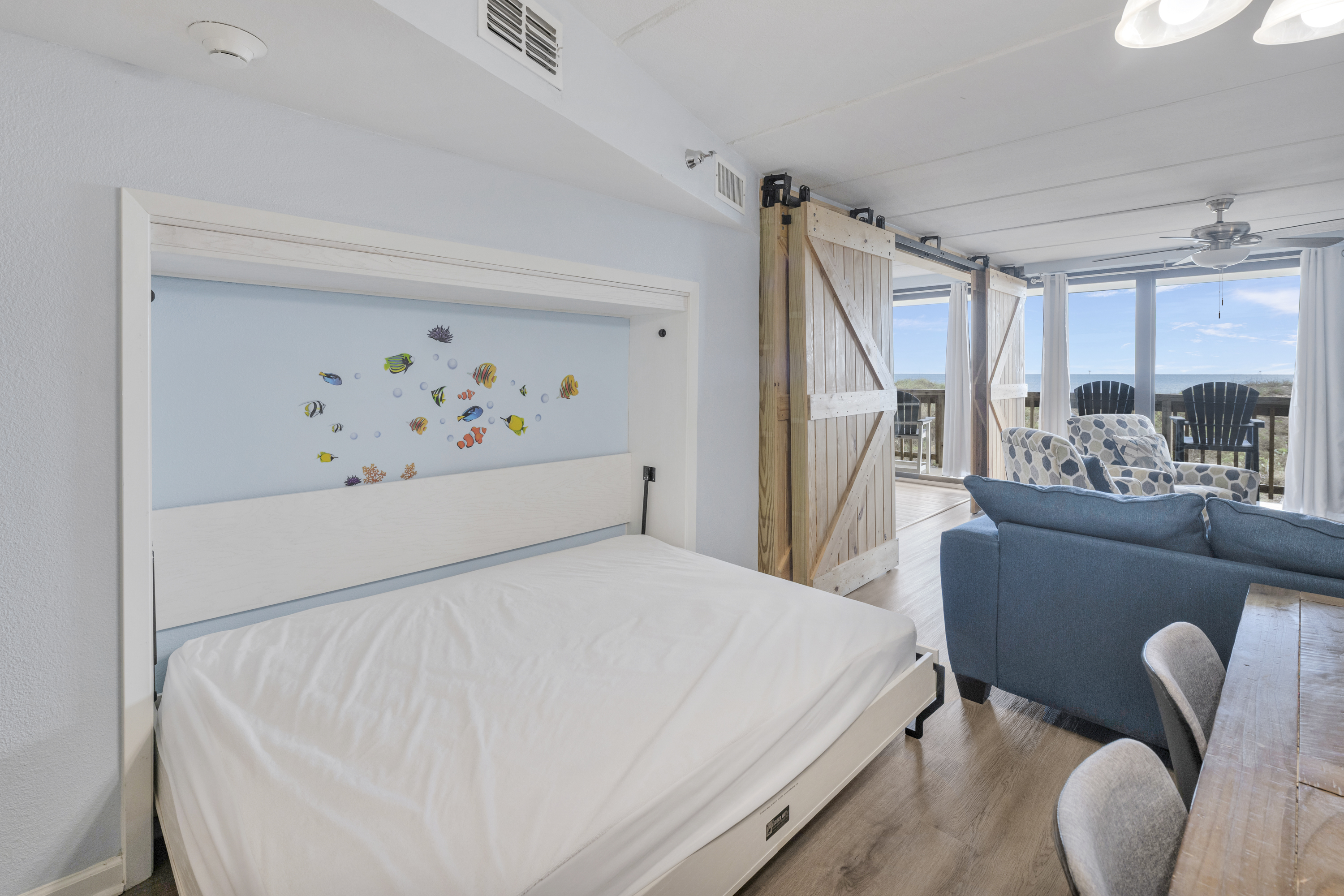 Accommodating up to 6, this unit offers a queen Murphy bed in the dining/living area for extra sleeping space.