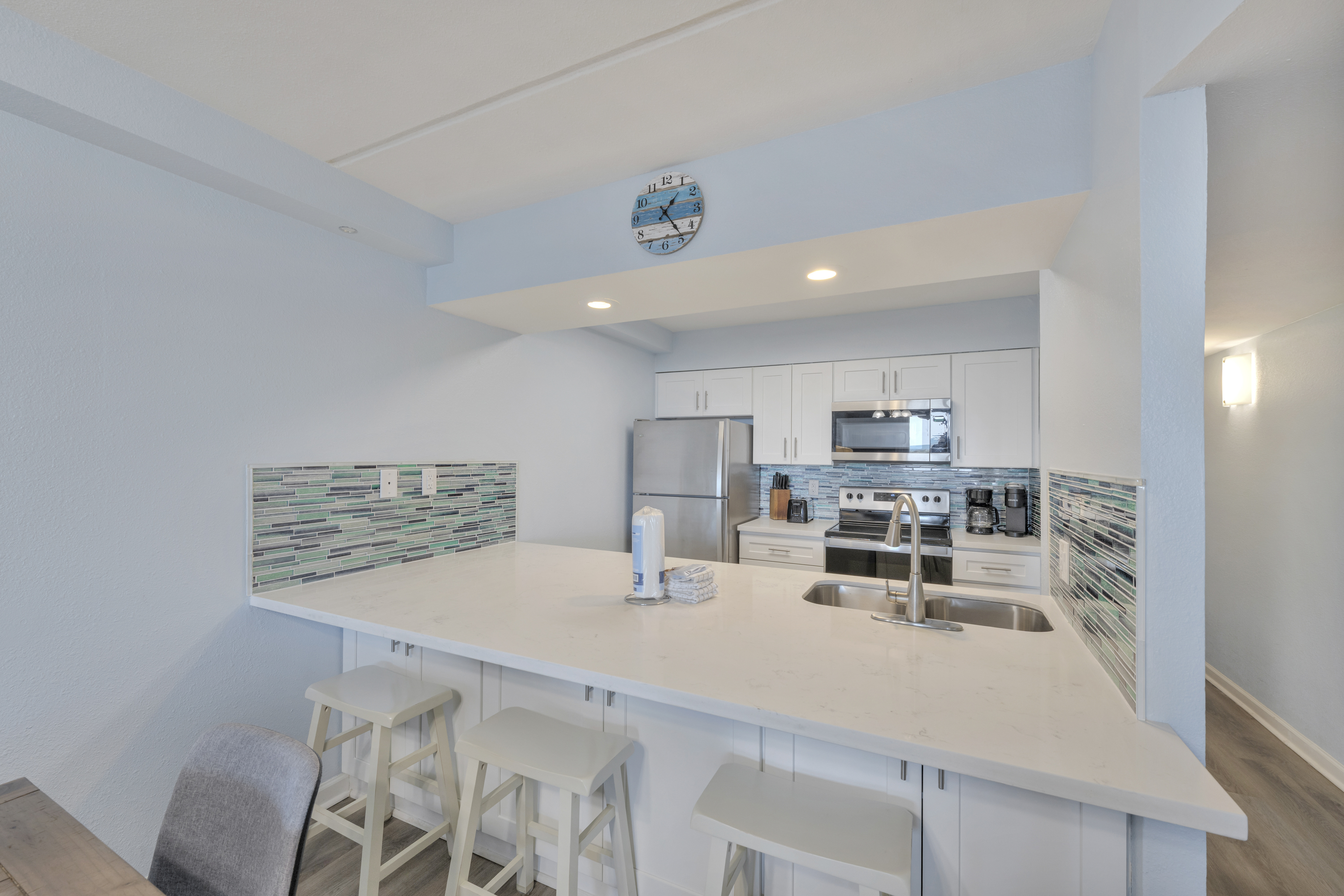 Enjoy casual meals at the breakfast bar alongside a fully equipped kitchen.