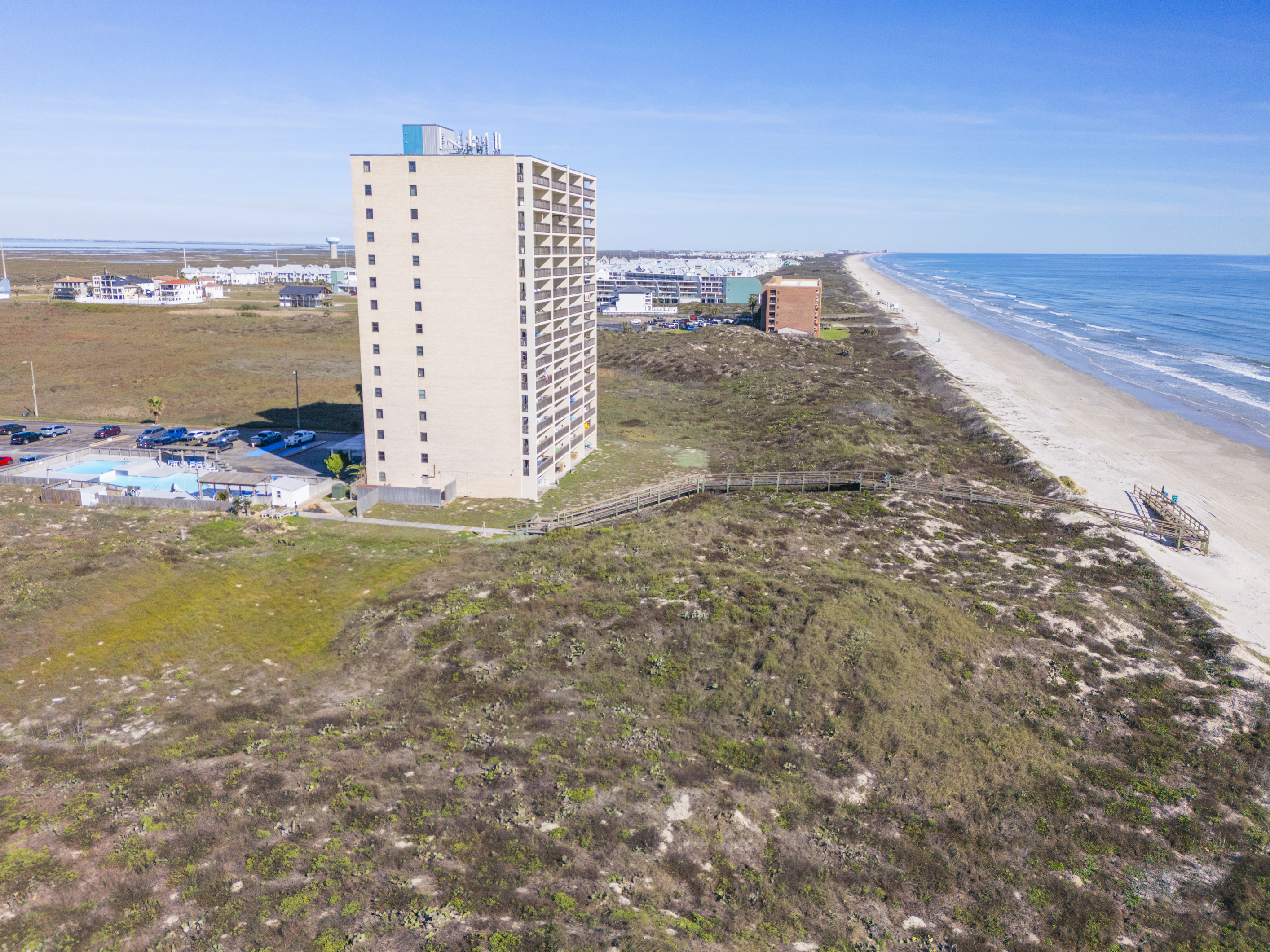 Mustang Towers guests enjoy golf cart access to explore the beach with ease and style.