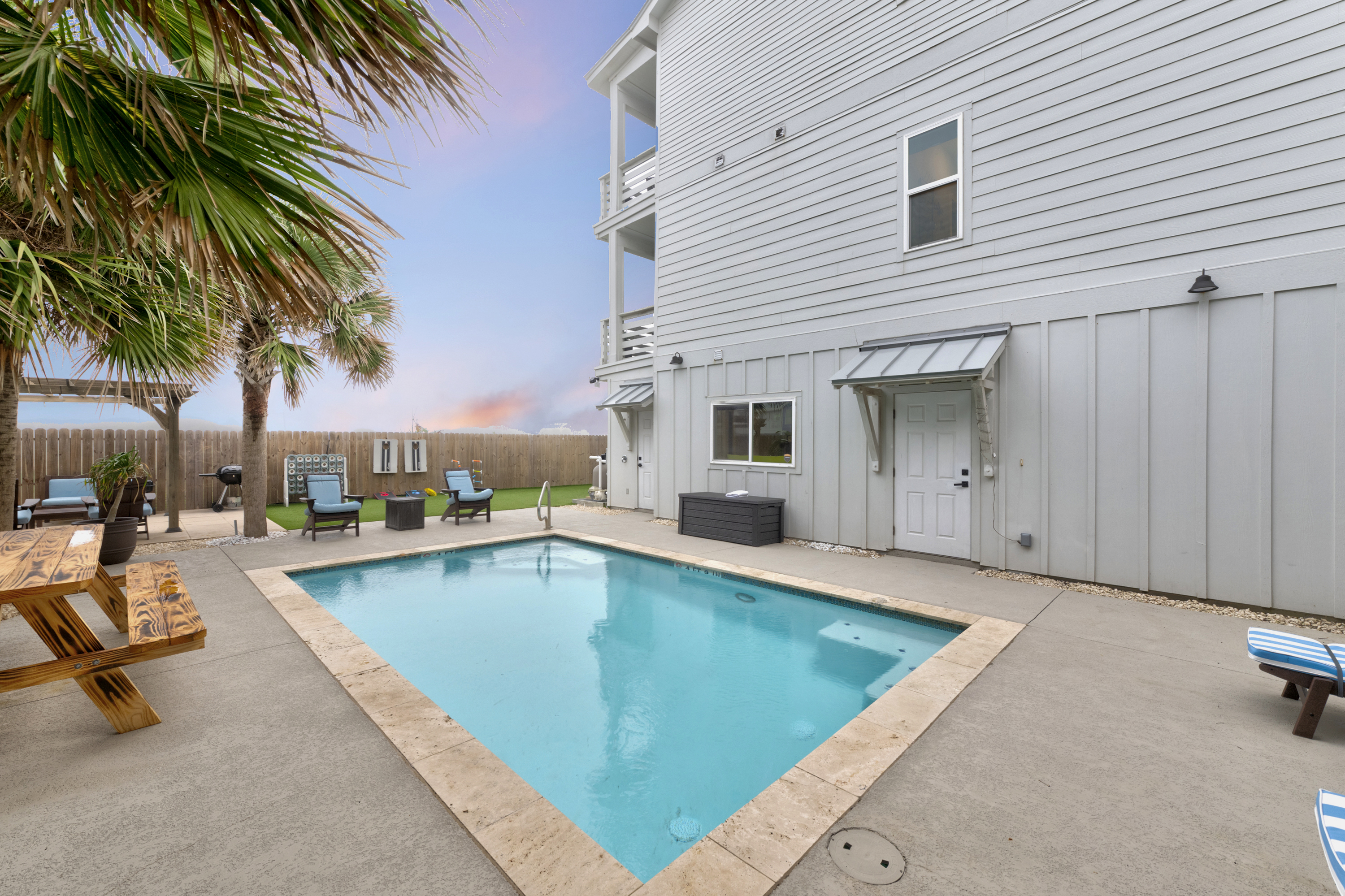 Fire up the grill, take a dip, and let the fun begin—this backyard has it all!