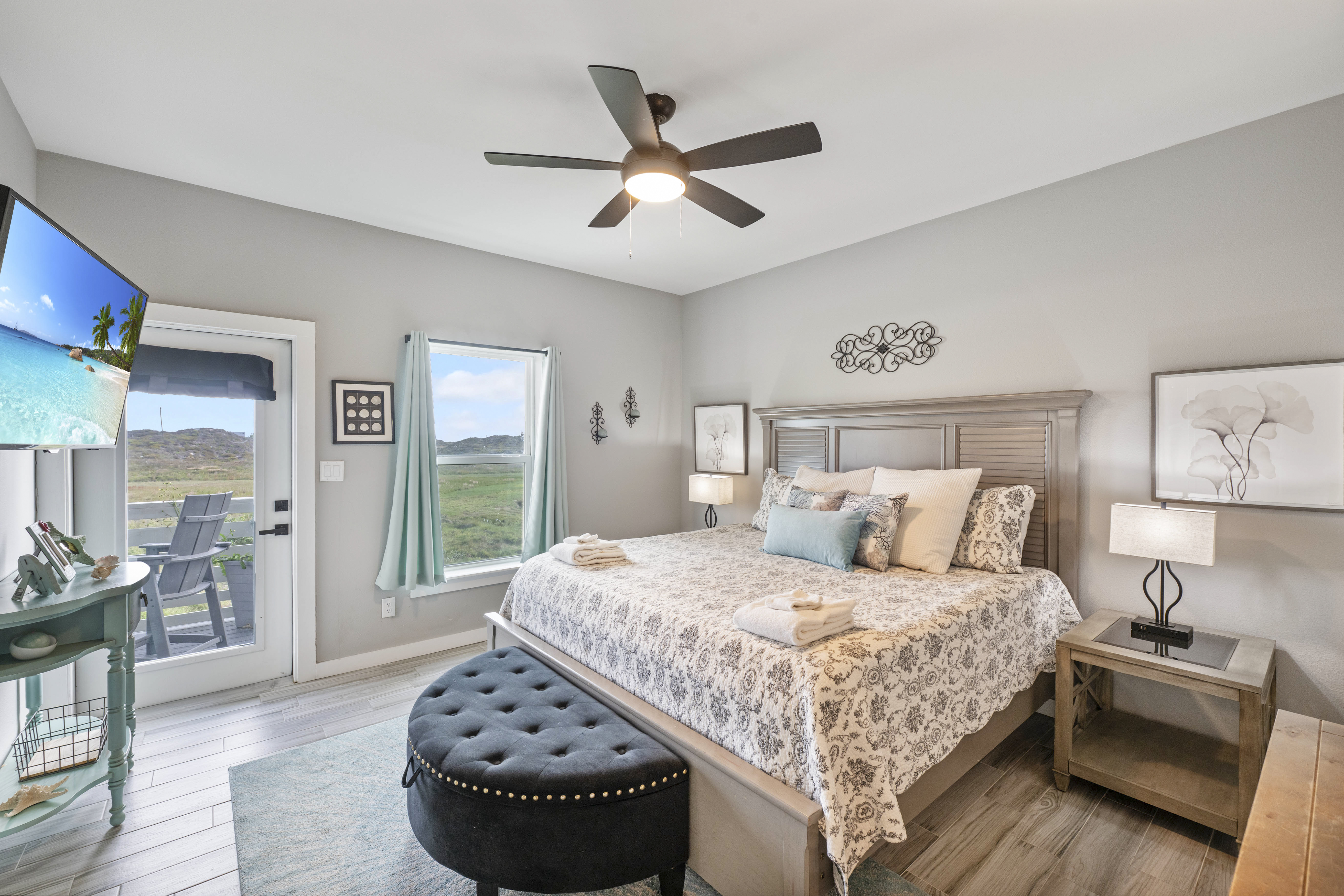 A charming king-size retreat with patio access, designed for relaxing, unwinding, and recharging after a day at the beach.