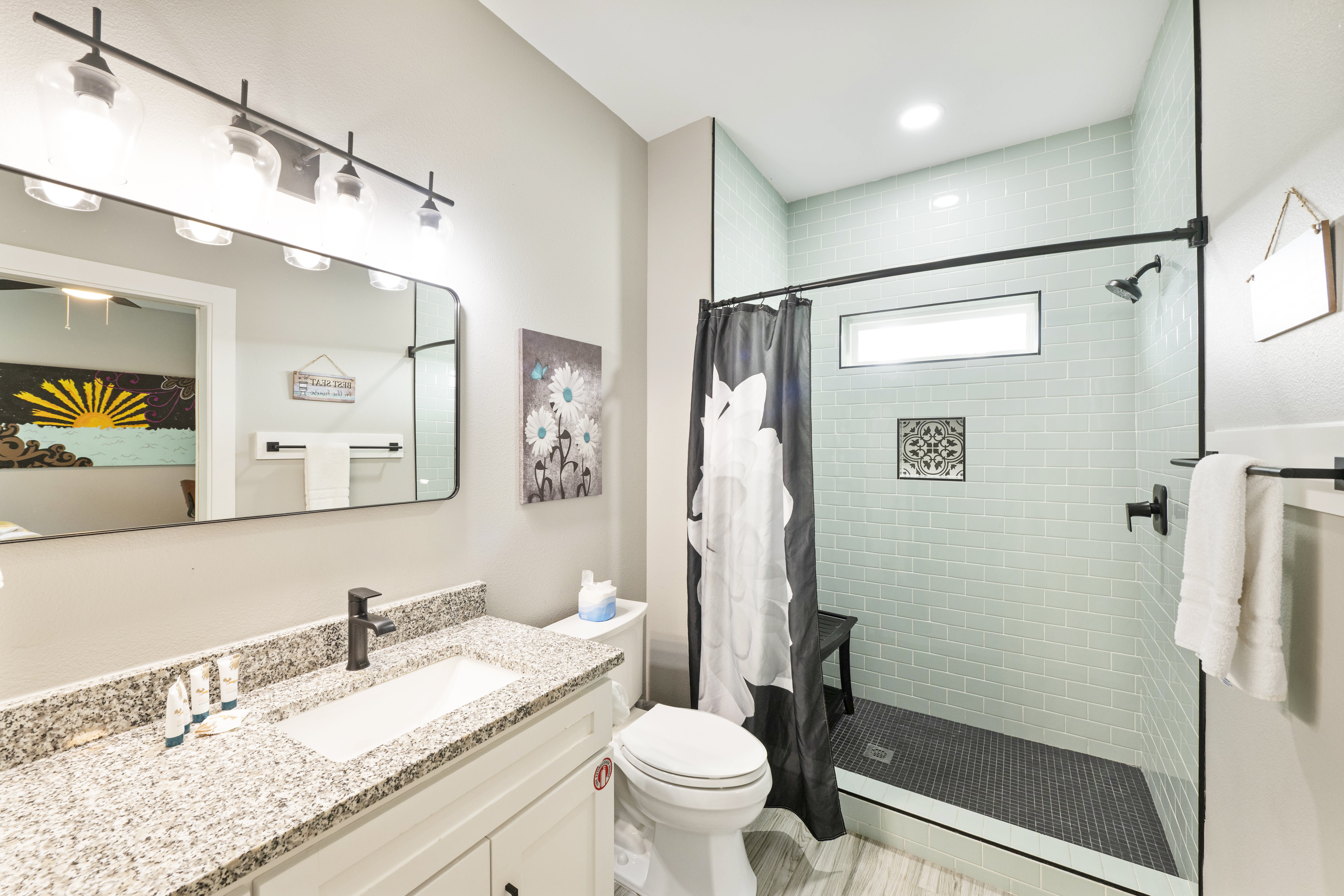 Indulge in a luxurious walk-in shower with a comfortable seat.