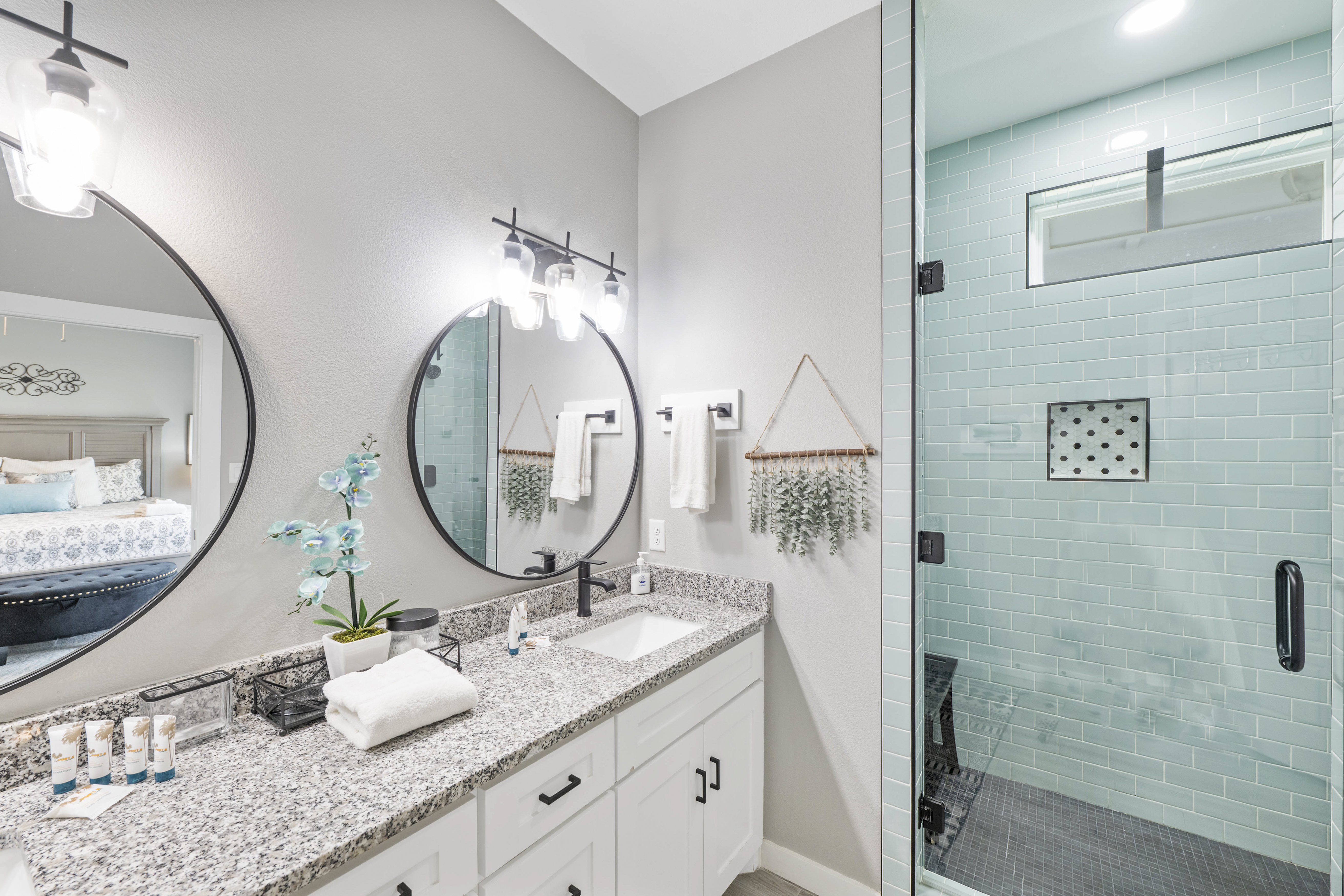Enjoy the luxury of a double vanity paired with a spacious walk-in shower.