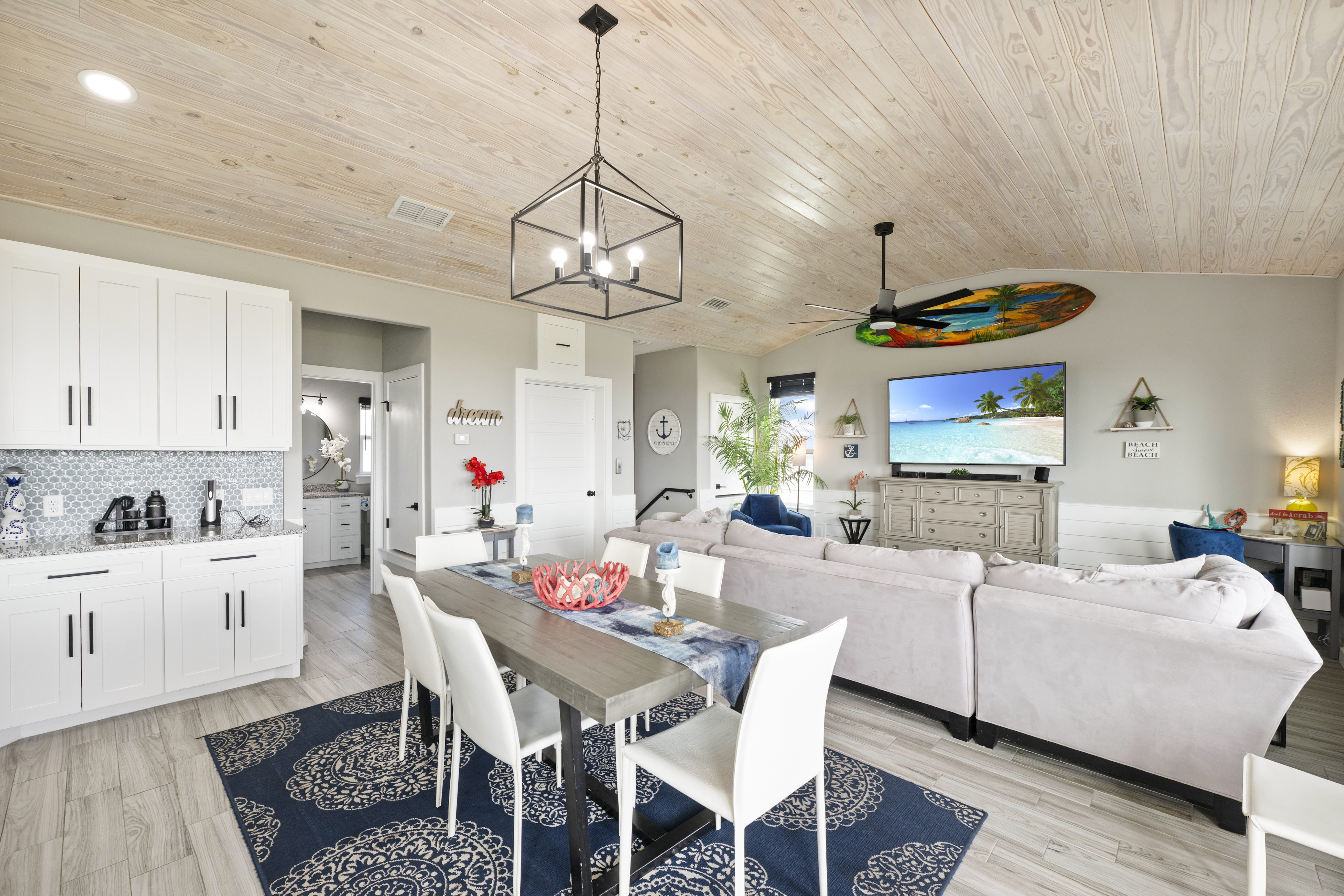 Enjoy meals and gatherings in the dining area next to the comfortable living room.