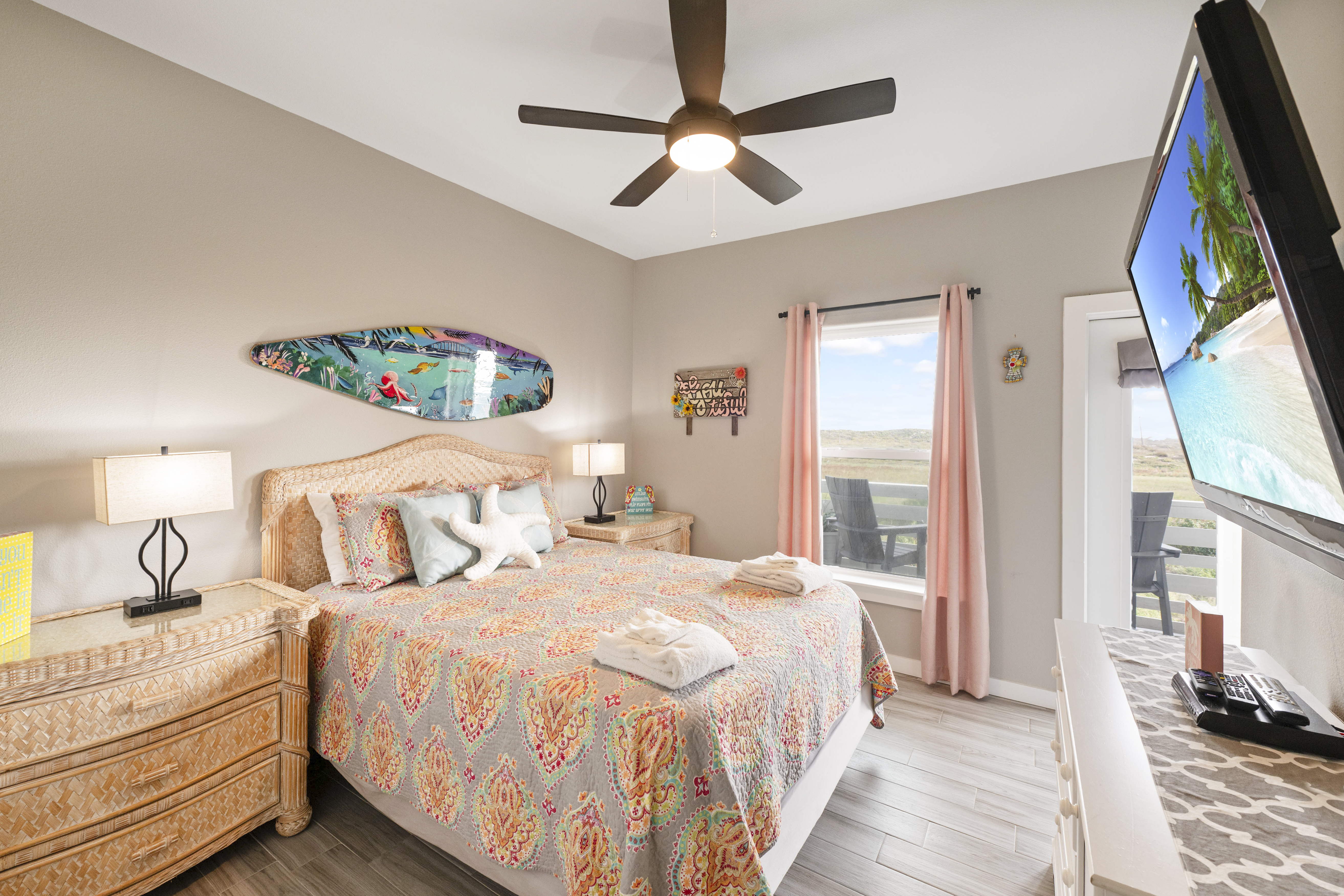 Step out from the queen bedroom onto the patio and take in the dunes with the Gulf just beyond.