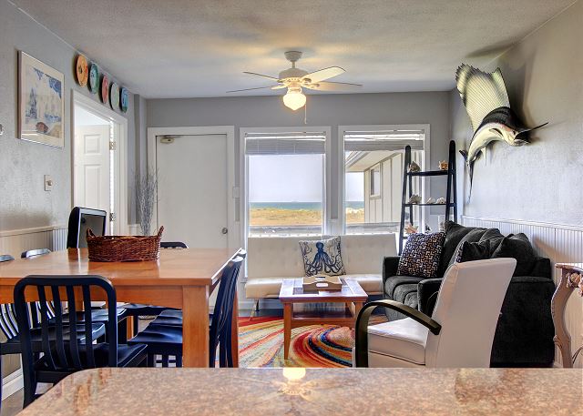Open dining and living area with beautiful views.