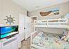 Nautical charm in this 2nd floor Triple bunk beds- twin over full with a twin trundle & shared bathroom
