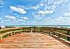 The pedestrian boardwalk to the beach from the subdivision is only feet away and has a large sitting and viewing area at top of the dunes.