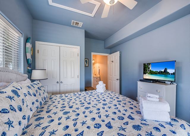 Queen bedroom with TV