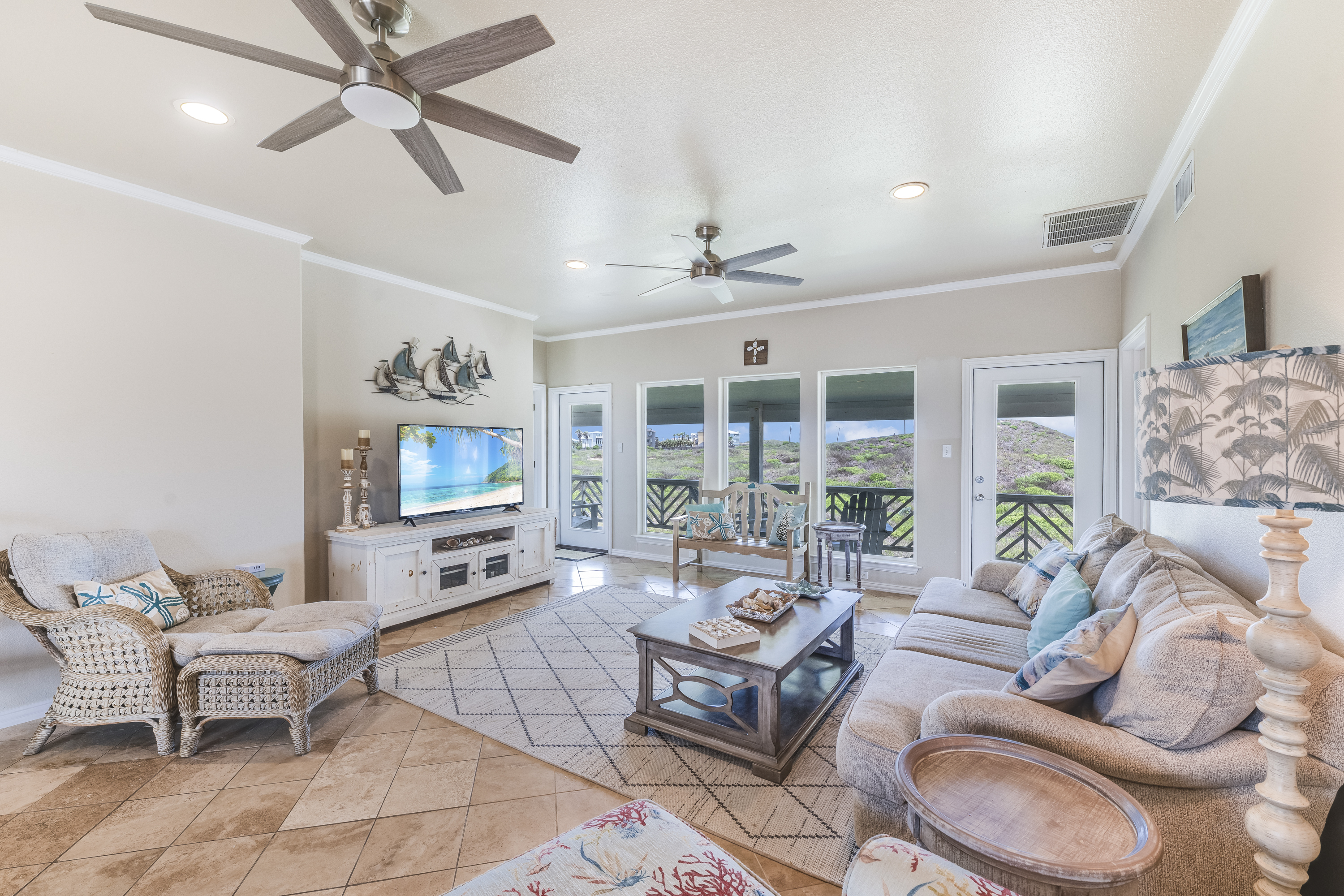 Large windows offering panoramic views and comfortable seating for family gatherings