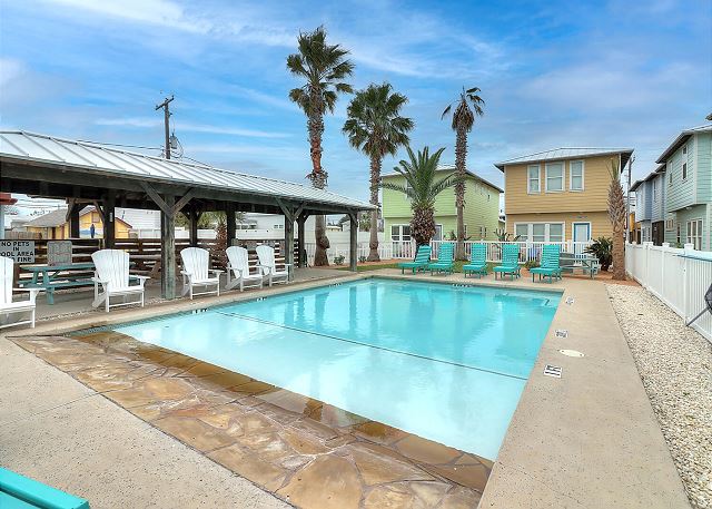 Community pool with covered patio area