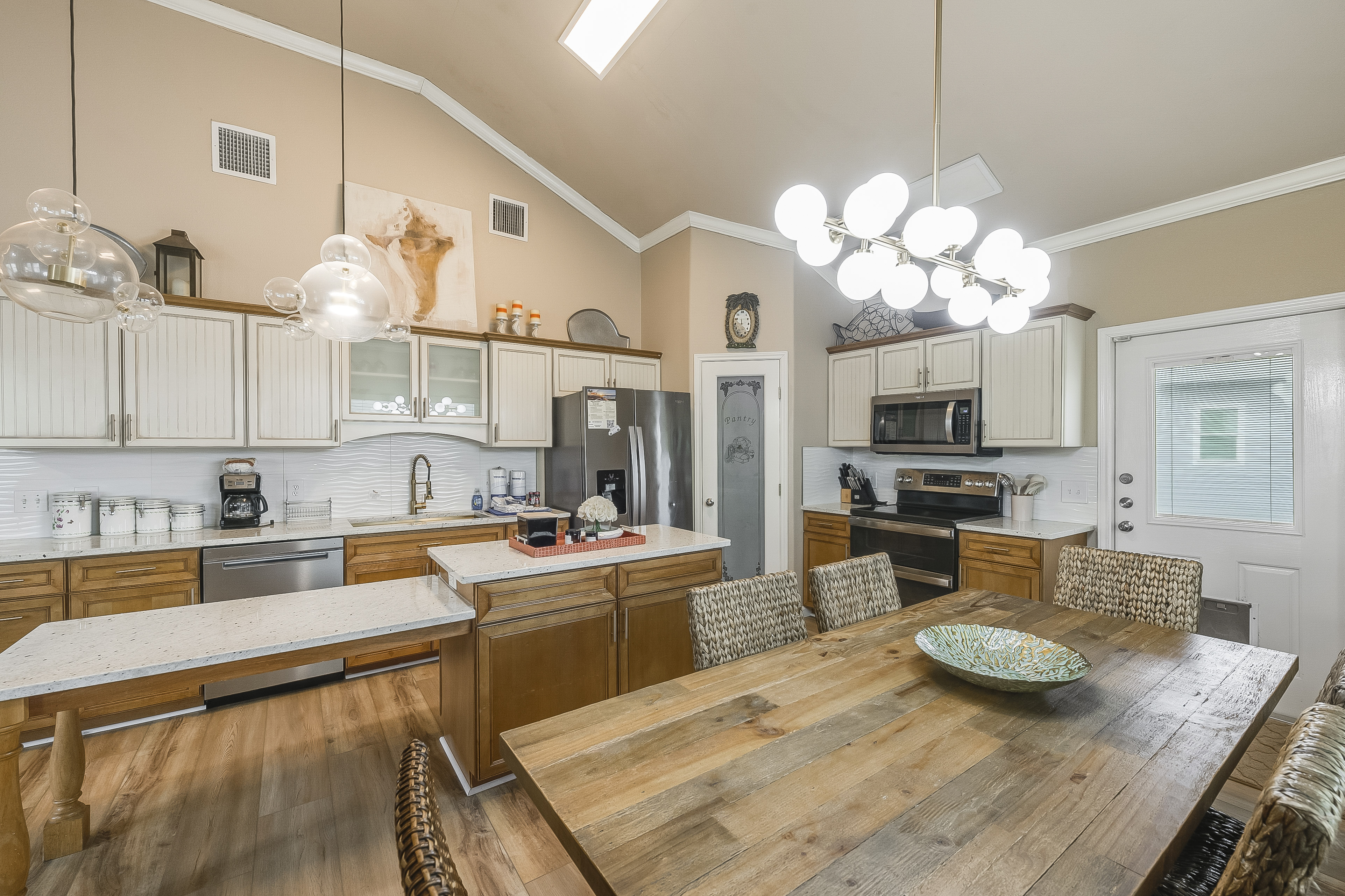 Experience culinary charm in this cozy kitchen, where efficiency meets elegance
