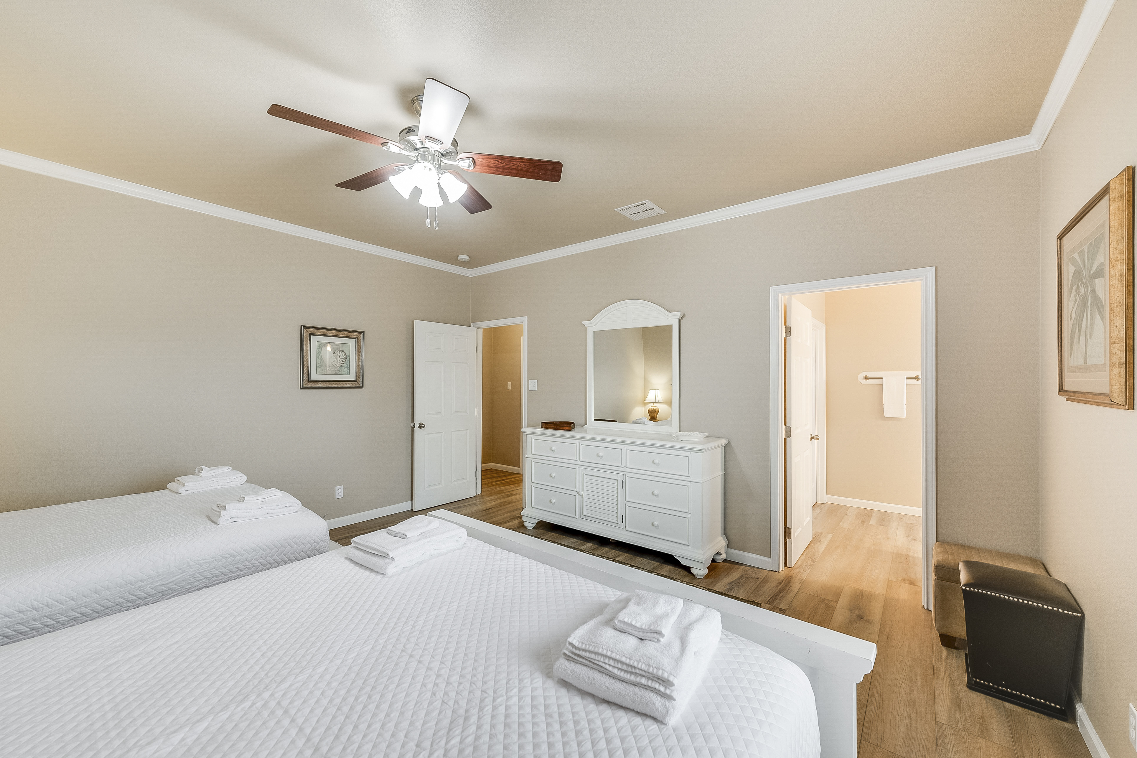 Bedroom 3 with a full sixed bed and a queen sized bed with its own ensuite bath