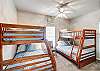 Bedroom 3 has two sets of twin over full bunk beds