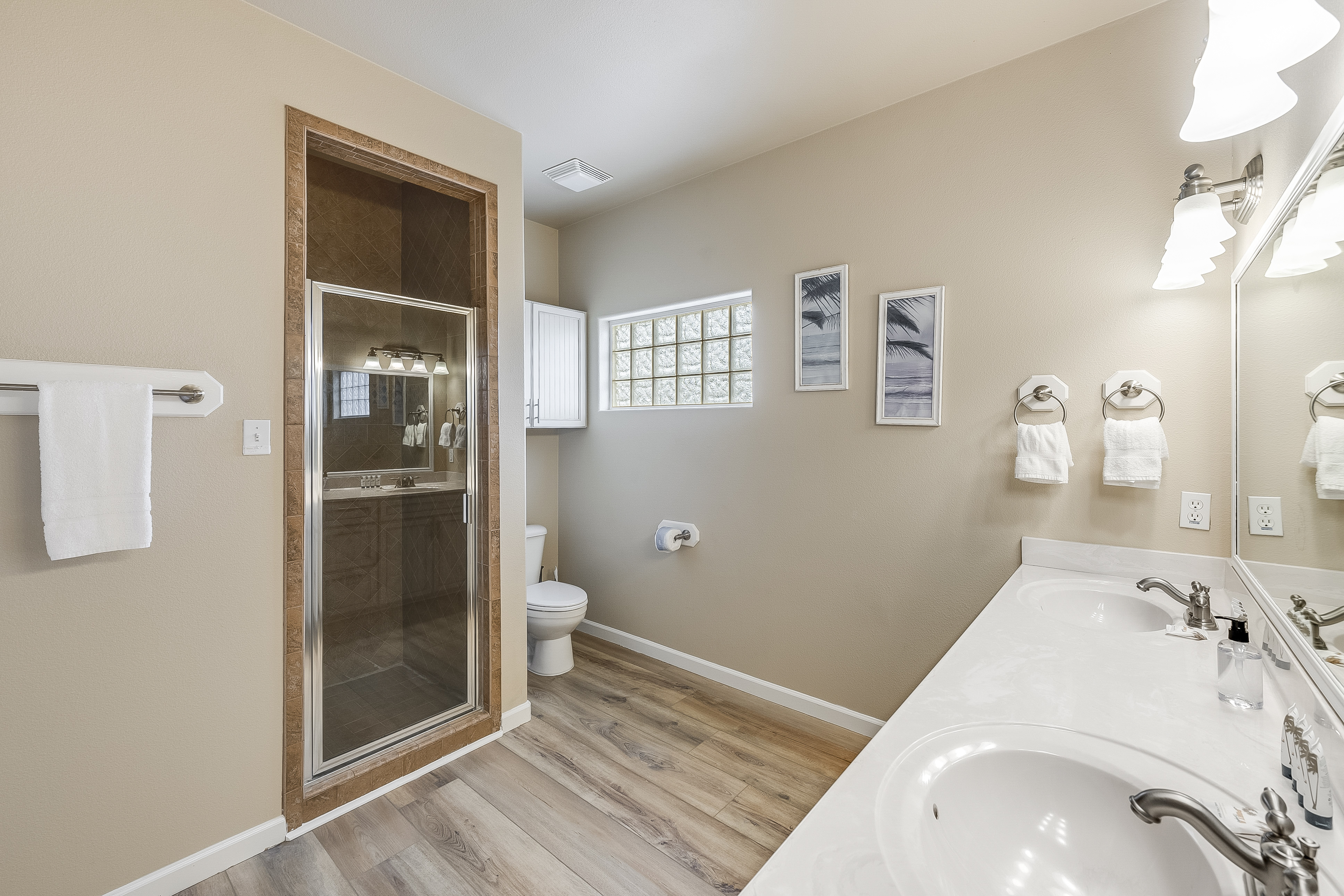 Stylish bathroom, contemporary sink and a low-step entry shower