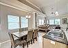 Natural light shines into the dining area