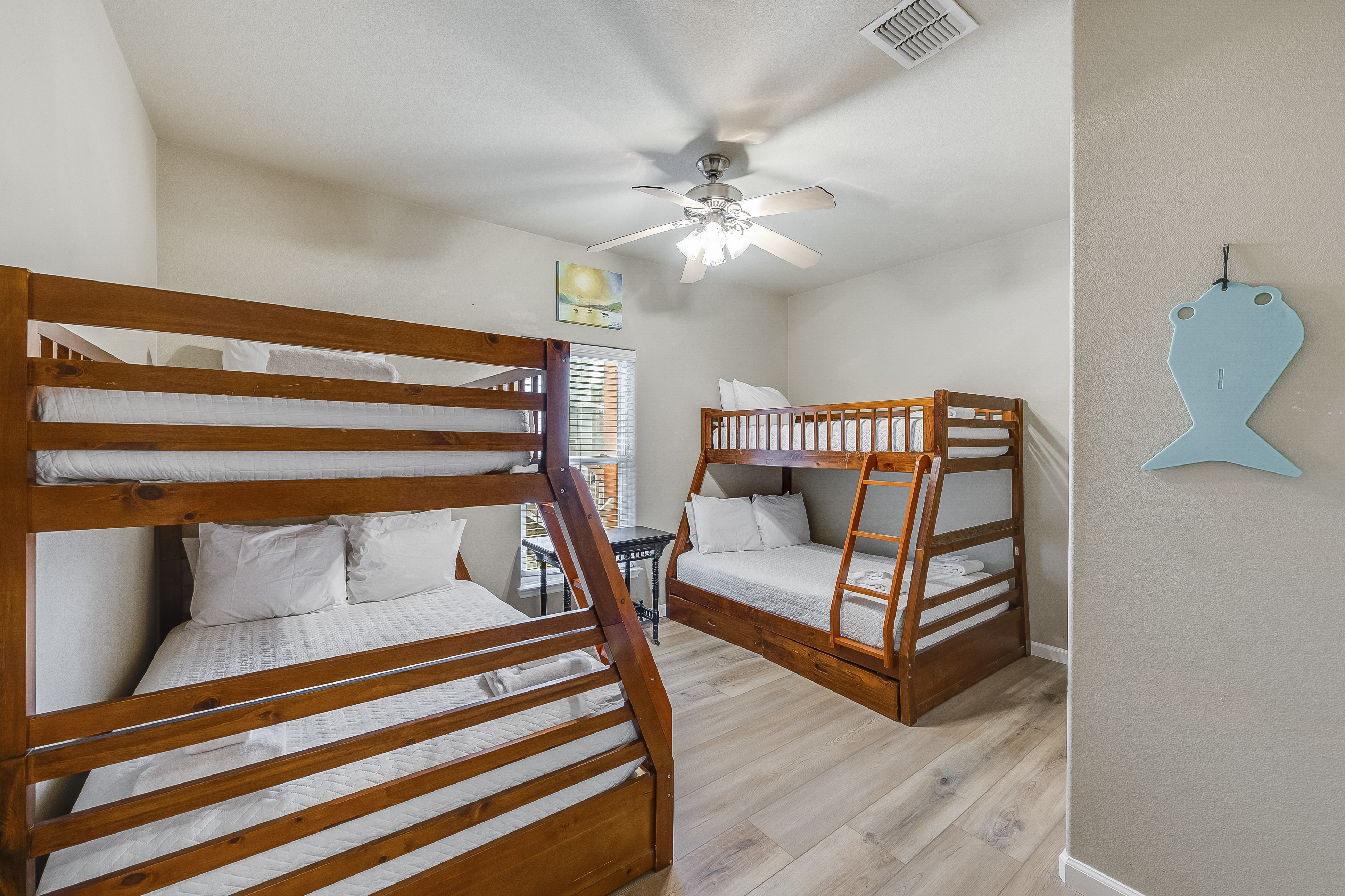 Comfortably designed for families or groups, offering two twin over full bunk beds.