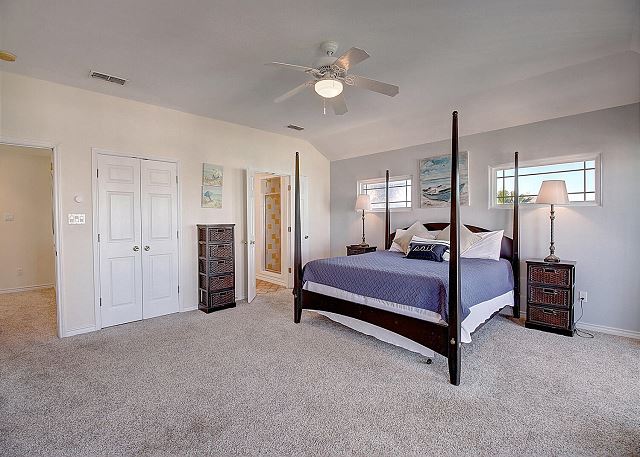 Main bedroom with king and ceiling fan