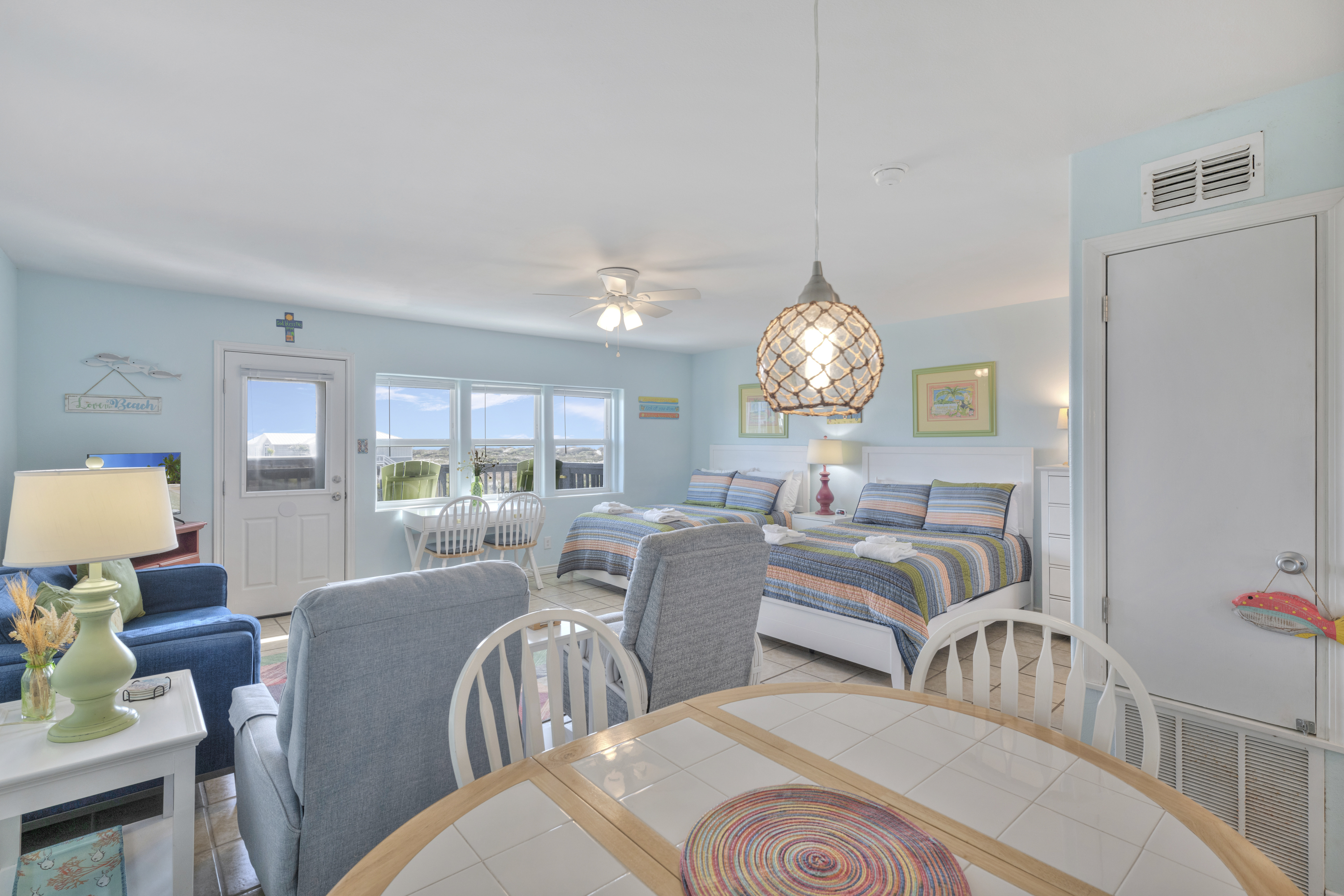 Share meals and laughter in the stylish dining space, enhanced by the coastal ambiance.