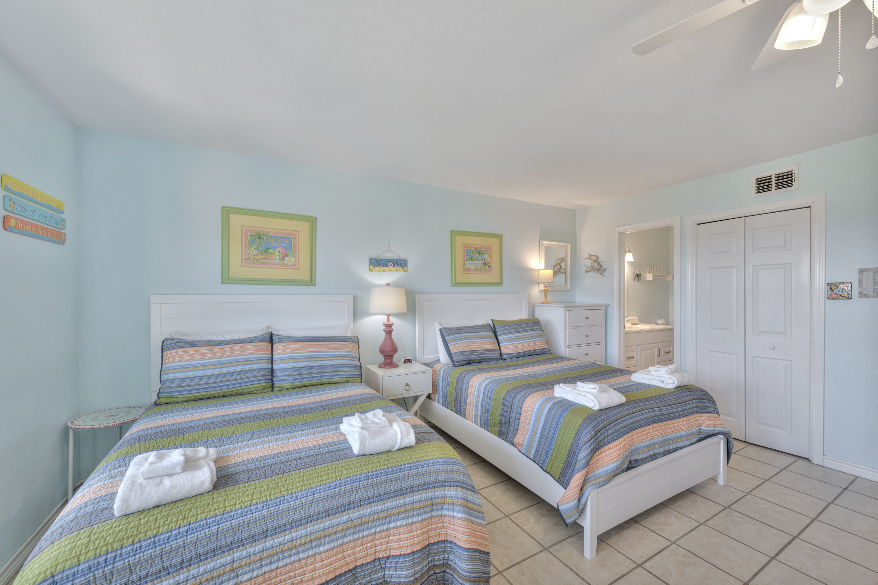 2 Firm Full Beds offer a cozy hideaway where comfort meets charm. The perfect spot to unwind, laugh, and drift off after a long day at the beach.