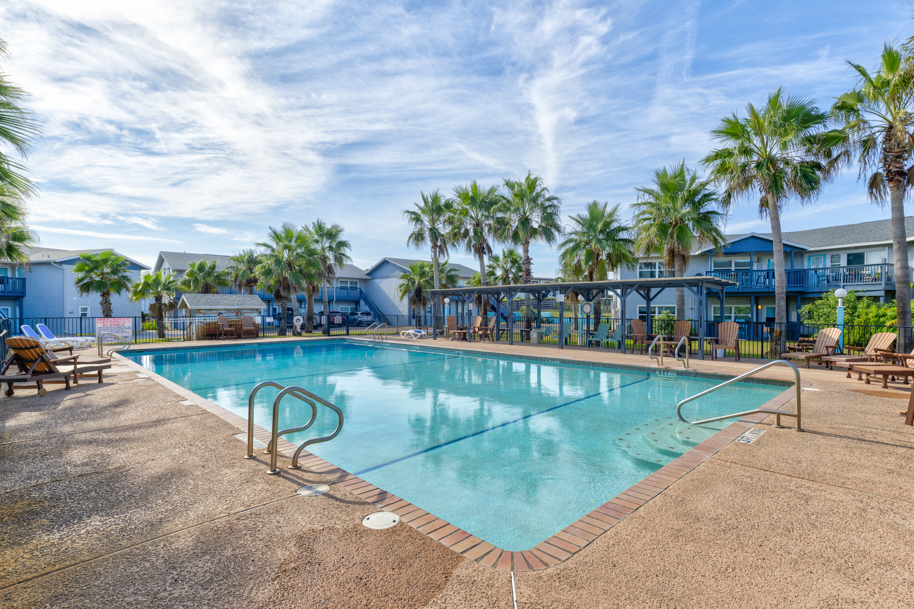 Island Vibes and Splashy Thrills at this Community Pool!