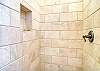 King suite's beautifully tiled walk-in shower