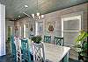 Timeless dining area with coastal charm and elegance