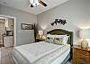 Charming master suite with a queen-size bed and beautifully appointed decor