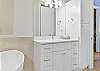 New remodeled primary bathroom with luxurious freestanding tub and spacious walk-in shower