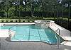 Private, heated pool & spa with screened in pool area