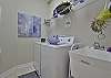 Laundry room with sink, washer and dryer