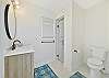 The new remodeled cabana bathroom off the pool deck is equipped with a shower