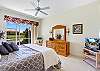 The master suite with gorgeous lake view offers a king sized bed with comfortable Tempurpedic mattress, a smart TV (with local channels only)and access to the screened lanai 