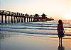 Beautiful beach sunset over the Naples Pier