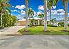 Tropical landscaping surrounds this Florida pool home, located just 2 miles to Bonita and Barefoot Beach!