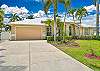 Tropical landscaping surrounds this Florida pool home, located just 2 miles to Bonita and Barefoot Beach!