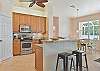 Fully equipped kitchen with breakfast bar