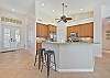 Fully equipped kitchen with breakfast bar