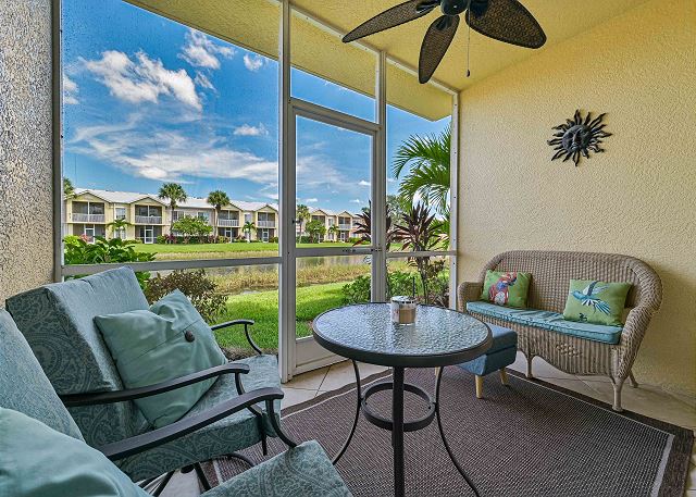 The screened in lanai offers lake view