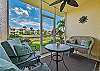 The screened in lanai offers lake view