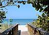 Beach entrance to Vanderbilt Beach and Wiggins Pass.