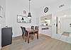 Dining off the kitchen. The table seats 6 (two additional chairs in both bedrooms)