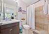 A spacious shower in the en-suite primary bathroom