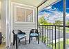 Sliding doors from the living and primary bedroom open up to the oversized screened in balcony.
