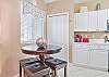 Fully equipped kitchen with breakfast nook 