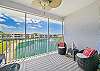 Sliding doors open up from the living to the screened in balcony with amazing view overlooking the lake and community pool. Perfect spot to start the day with a morning coffee outside while looking at the spectacular sunrise! 