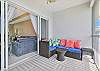 Sliding doors open up from the living to the screened in balcony with amazing view overlooking the lake and community pool. Perfect spot to start the day with a morning coffee outside while looking at the spectacular sunrise! 