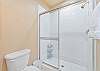 Guest bathroom with a shower-tub combo