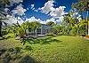 Lush, private landscaping surrounds this Bonita pool home