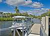 The Pelican Sound  Beach Shuttle Boat leaves the River Club dock for leisurely cruises down the scenic Estero River to Lovers Key, and the boat ride often includes dolphin watching, and is as pleasurable as the destination! 